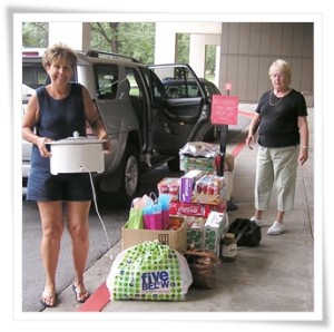 Deb and Jean unloading.