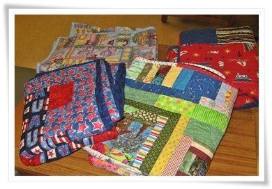 We started out with 8 quilts. Two more, the boat one and the patriotic one had found a home by the time we left.