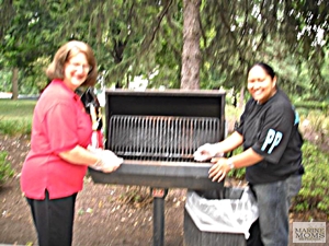 cleaning the BBQ at Mercy Hall